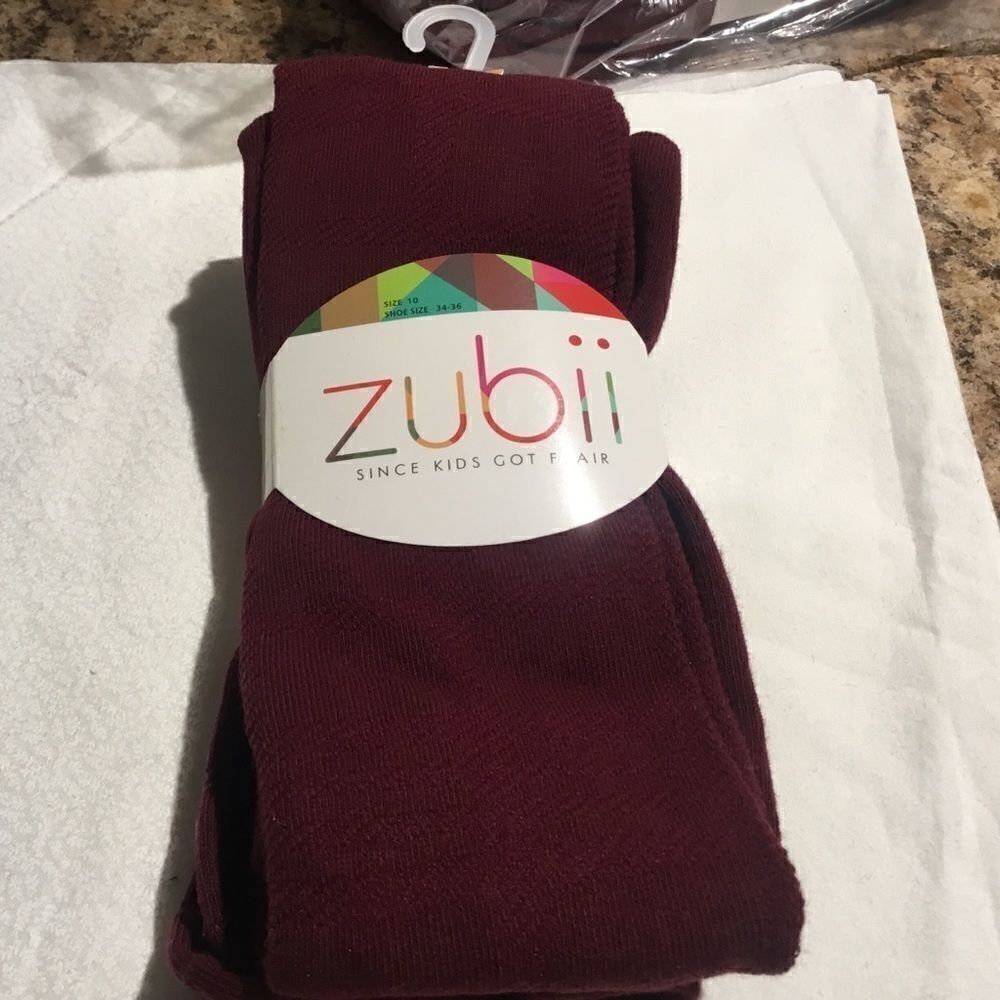 SALE. BUY 3/$10. NWT. Girls Tights Size 10. Wine Colored